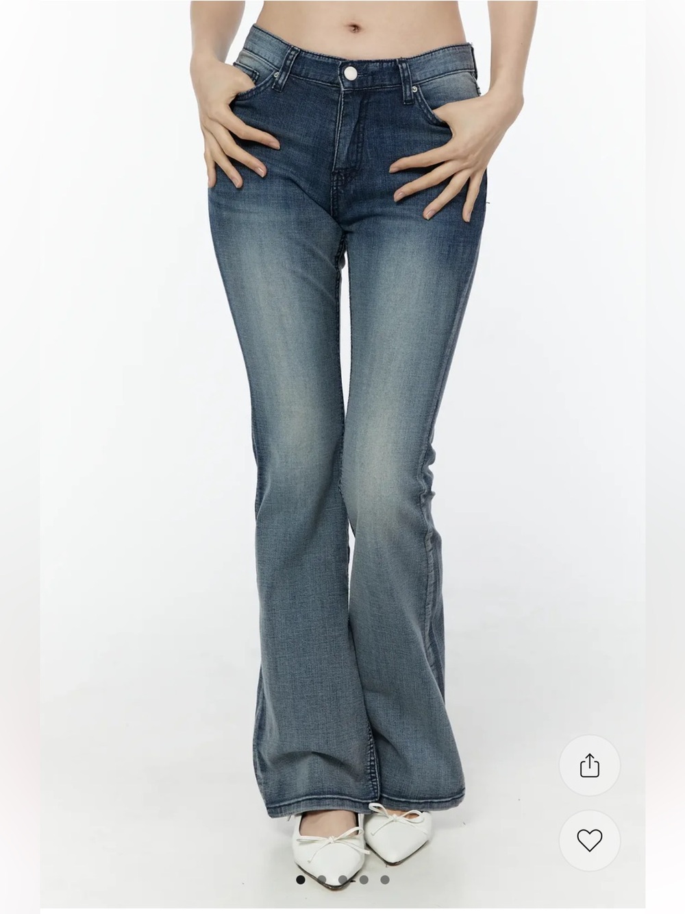 Mid rise medium wash flare bootcut leg jeans with back pocket